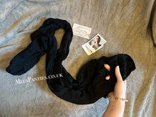 Load image into Gallery viewer, A pair of used black tights