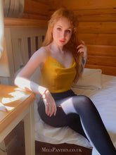 Load image into Gallery viewer, Melkimnylon in a yellow satin camo top and black used tights