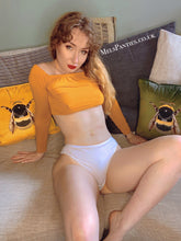 Load image into Gallery viewer, MelKimNylon wearing a yellow crop top and sitting with her legs open wearing some white cotton panties